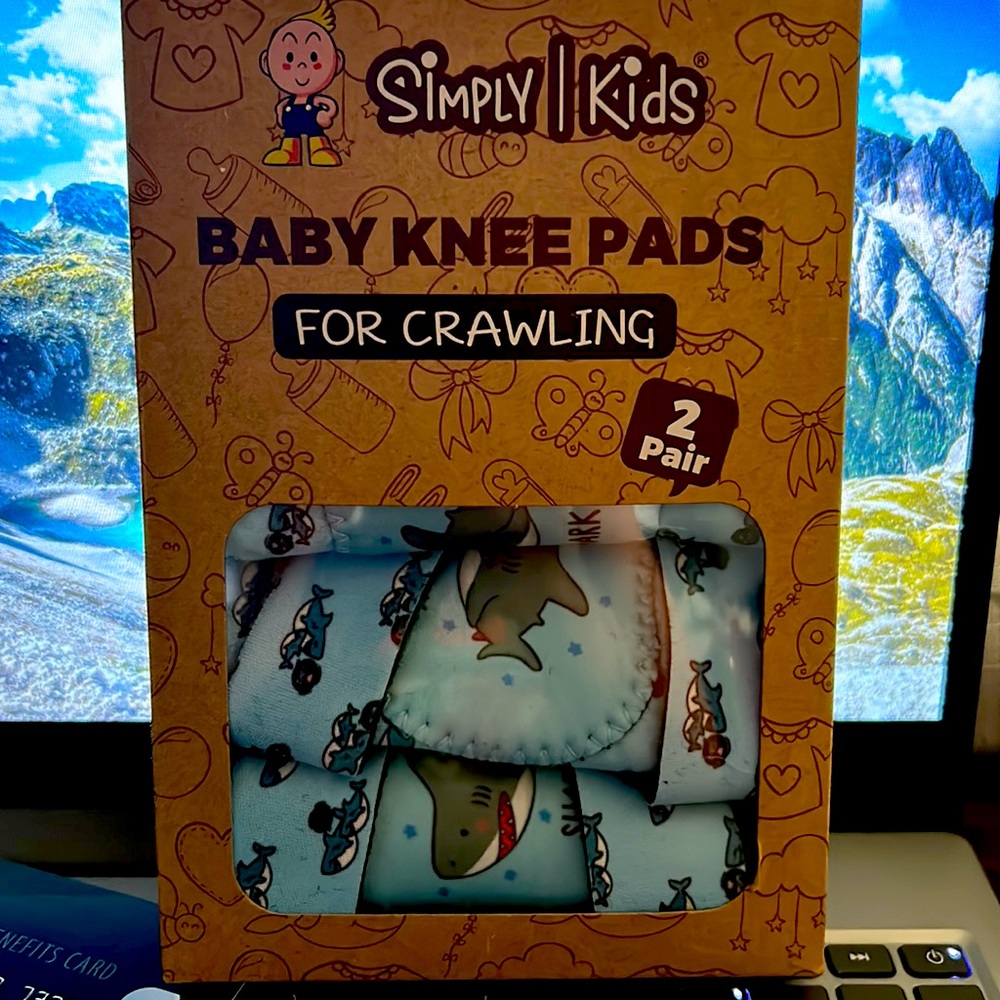 Baby knee pads for crawling .  Simply kids brand. 2 pairs. New without tags